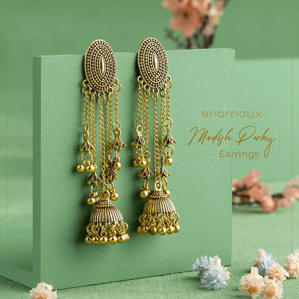 antique tassel flower dangle earrings green background