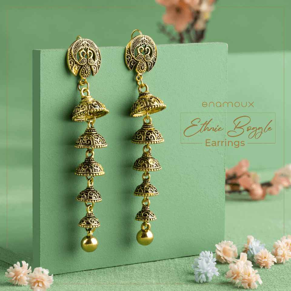 antique multi layer dangle earrings green background