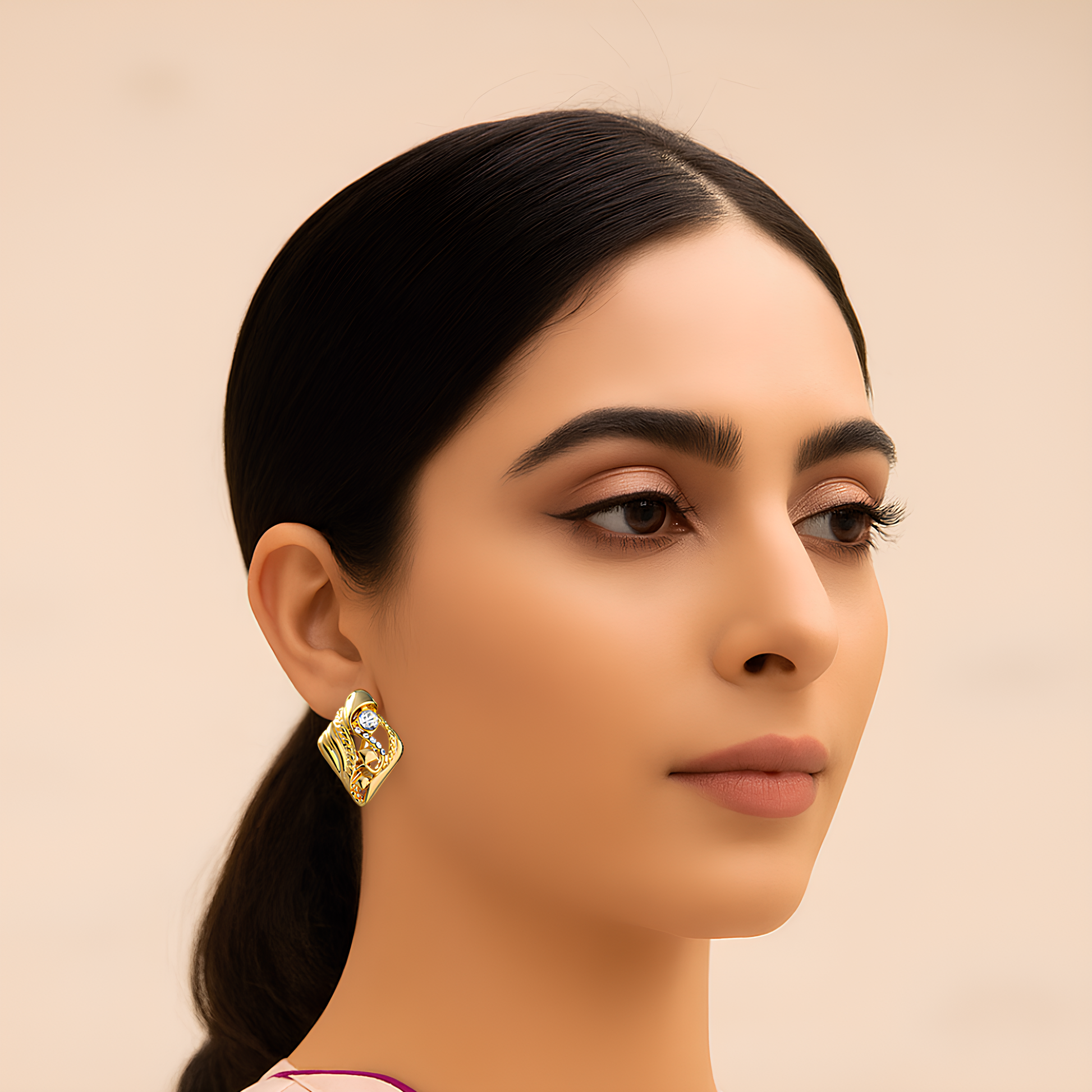 model wearing gold studs