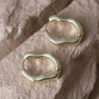 twisted hoop earrings gold