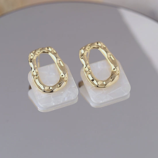 Hoax Studs Earrings
