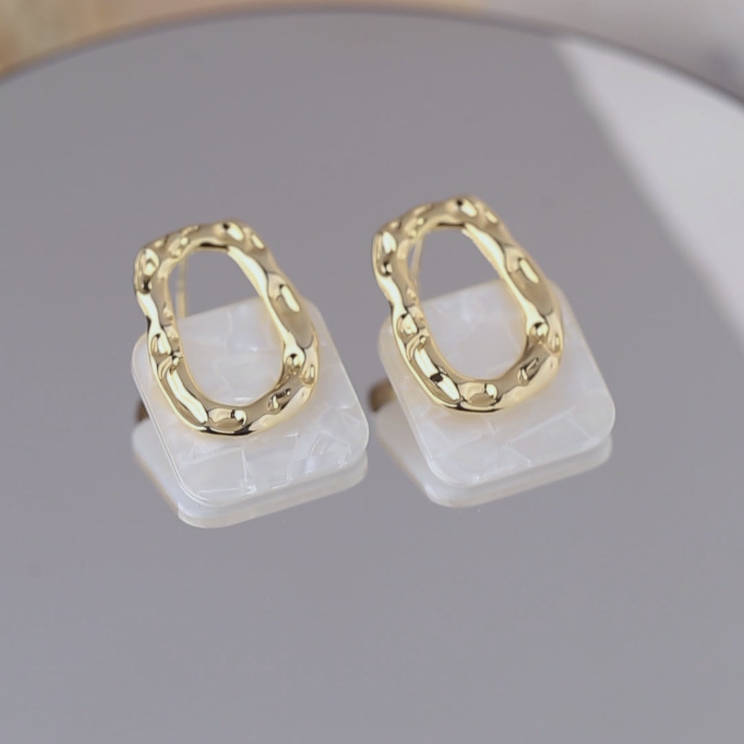 Hoax Studs Earrings
